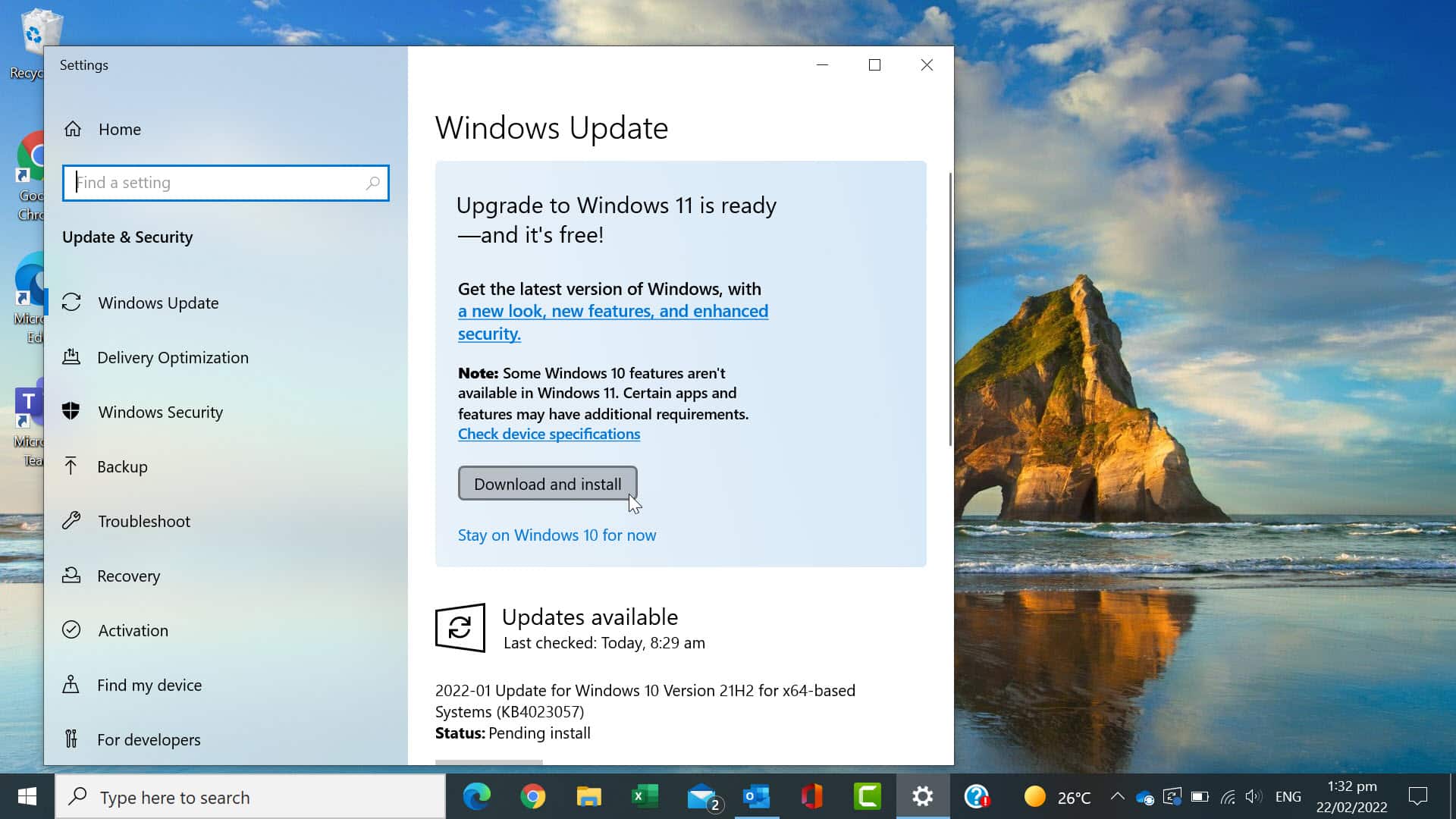 In the Update & Security are with a message saying "Upgrade to Windows 11 is ready - and its free!". The mouse is pointing towards the Download and install button 
